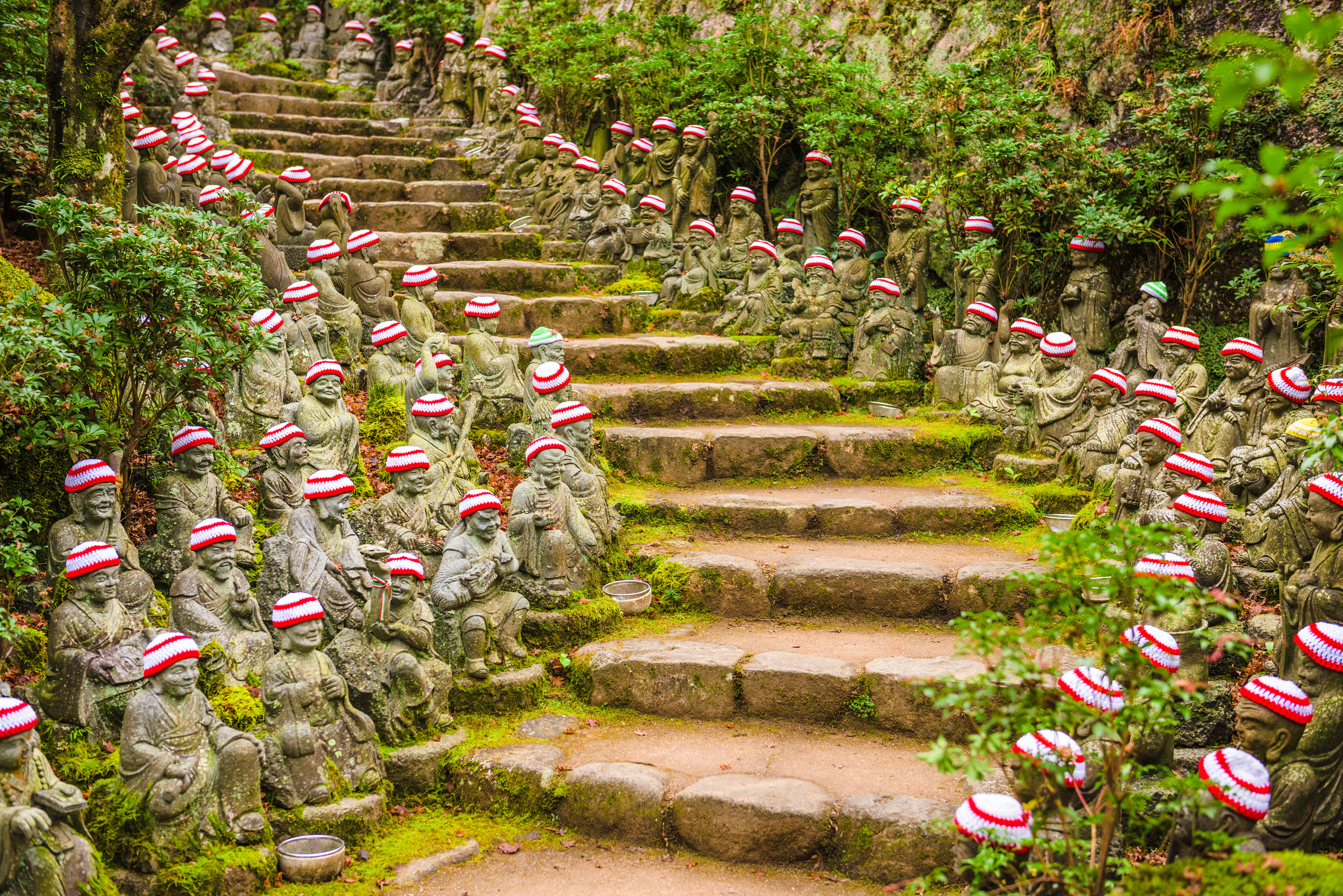 The Daisho-in temple, a little out of the way on the sacred island of Miyajima, is worth a visit with its 500 small Buddhist statues wearing a cap