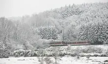 Train image under snow by John Doe